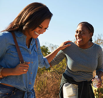 Two women laughing together