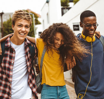 Four young adults hanging out together