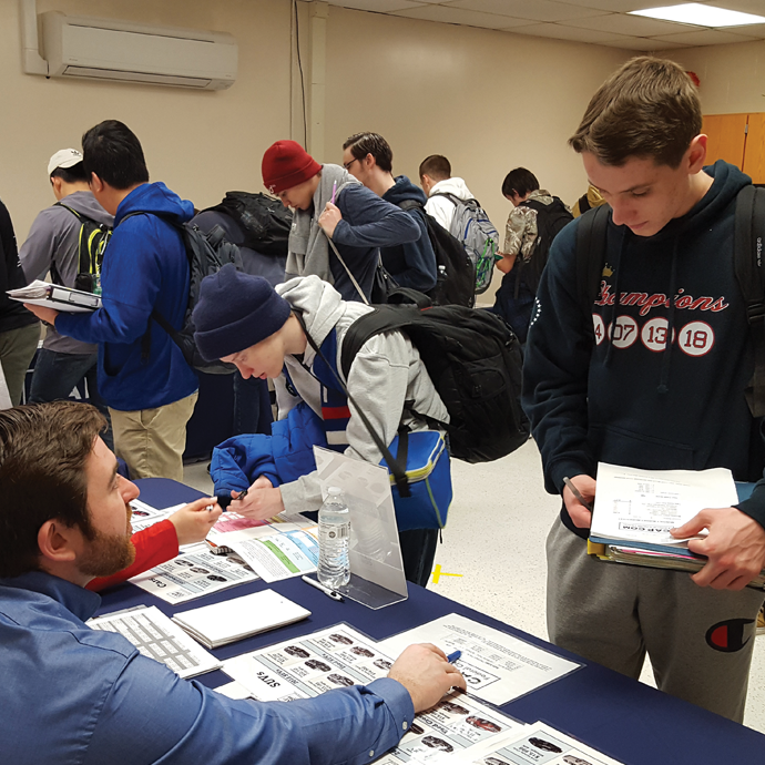 Local high school students at a financial reality fair