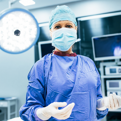 A female surgeon in the operating room.