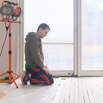 Man fixing floor