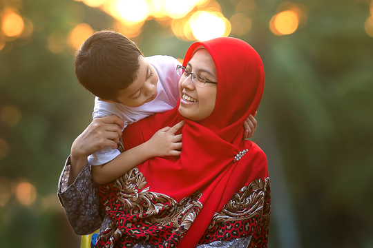 Son hugging mom