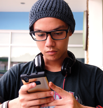 Student looking at phone